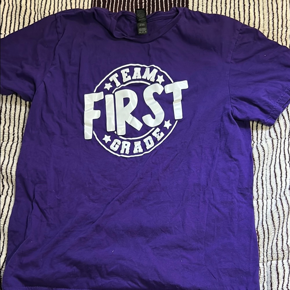 Vibrant Purple Short Sleeve Tee with Bold Circular Design